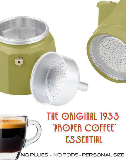 An olive green moka pot coffee maker shown disassembled on a white background, with a glass cup of espresso at the bottom left and orange text reading 'THE ORIGINAL 1933 "PROPER COFFEE" ESSENTIAL' and 'NO PLUGS - NO PODS - PERSONAL SIZE'.